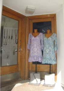 Dresses in the doorway of the shop