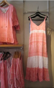 Peach-coloured summer dresses, which the English would call frocks.